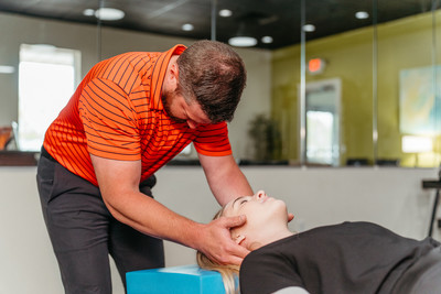 chiropractic approach to neck pain relief at Eastside Wellness in Creve Coeur, IL
